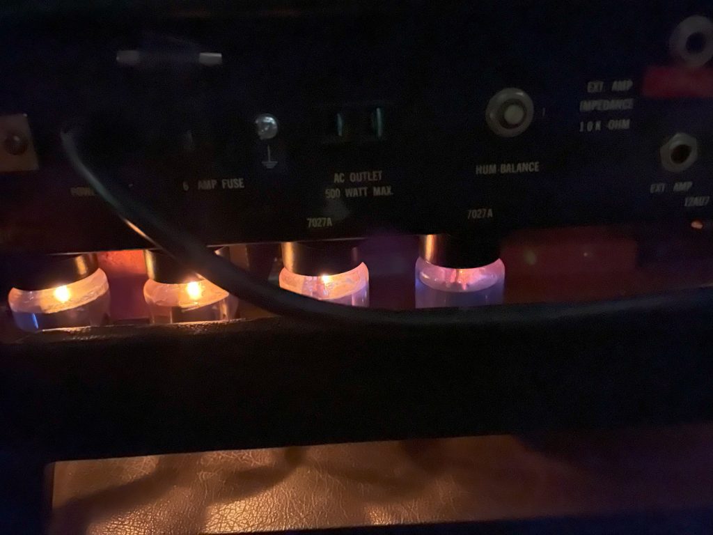 Ampeg amplifier output tubes lit.